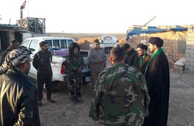 مبلغو العتبة العلوية في لجنة الإرشاد يتفقدون قوات الحشد الشعبي المرابطة في "عكاشات"  على الحدود السورية